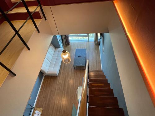 an overhead view of a staircase in a house at Elysia Boutique Hotel in Busan