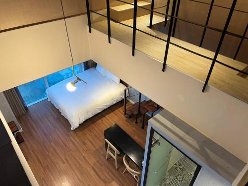 an overhead view of a bedroom with bunk beds at Elysia Boutique Hotel in Busan