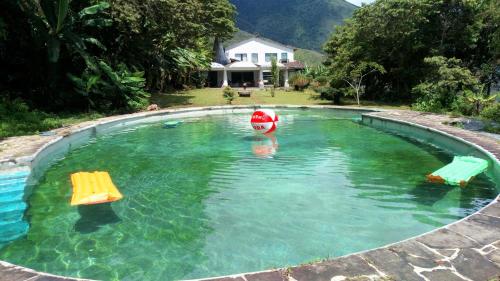 Bazén v ubytování Orquideas de Elena nebo v jeho okolí