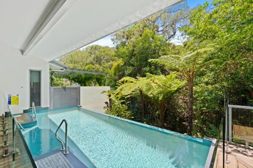 Afbeelding uit fotogalerij van Belle Escapes 60 Ocean Palm Cove in Palm Cove