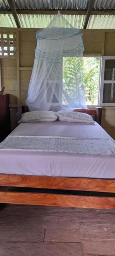 Posteľ alebo postele v izbe v ubytovaní La Mariola - Finca Agroecológica