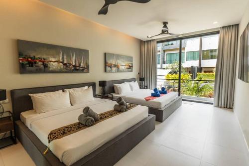 Ένα ή περισσότερα κρεβάτια σε δωμάτιο στο Attractive SeaView 4br Private Pool Villa