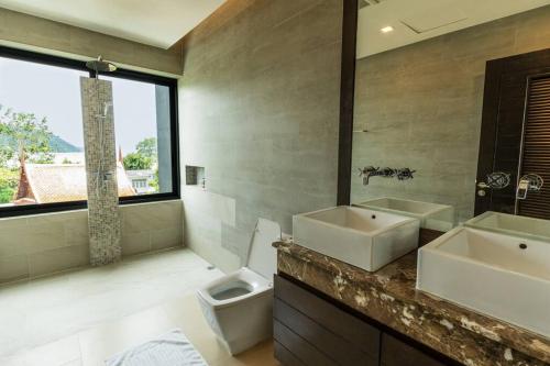 Ένα μπάνιο στο Attractive SeaView 4br Private Pool Villa