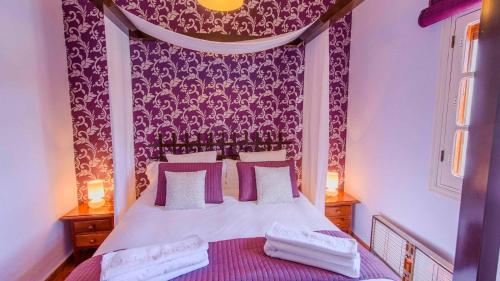 Postelja oz. postelje v sobi nastanitve Casa Romantica Montecorto by Ruralidays