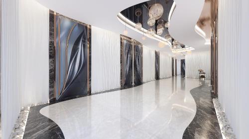 a hallway with black and white walls and a shiny floor at Royal M Al Aqah Beach Resort by Gewan in Al Aqah