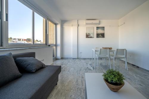 Χώρος καθιστικού στο Conjunto de APARTAMENTOS ANTIGUO PALACIO HOTEL PARIS