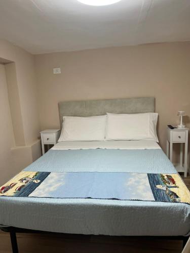 Ένα ή περισσότερα κρεβάτια σε δωμάτιο στο La petite maison