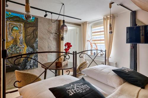 Postel nebo postele na pokoji v ubytování Neidorf Inn