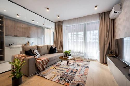 Et opholdsområde på Tribal 1BR in Aviatiei