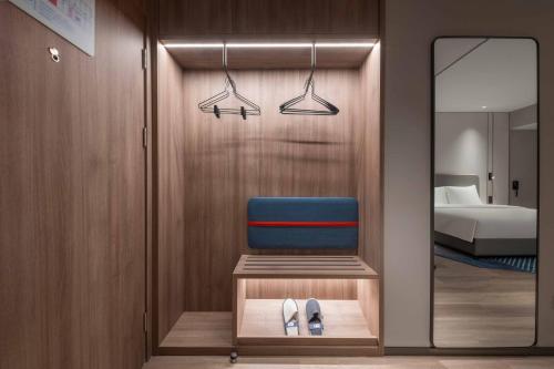 Ένα ή περισσότερα κρεβάτια σε δωμάτιο στο Holiday Inn Express Mianyang Sci-Tech City by IHG