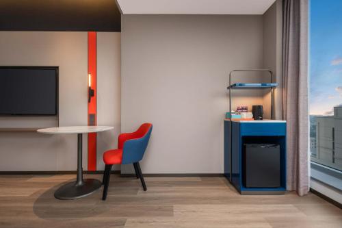 Μια τηλεόραση ή/και κέντρο ψυχαγωγίας στο Holiday Inn Express Mianyang Sci-Tech City by IHG