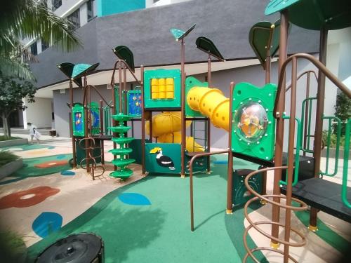 an empty playground in a building with a slide at Japandi Family Play Suite with Slide Bunk Bed in Kajang
