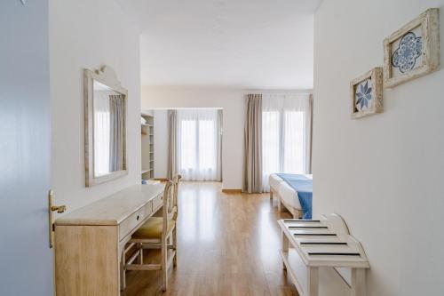 Voodi või voodid majutusasutuse Hostal HPC Porto Colom toas