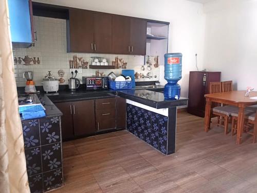 Kuchyň nebo kuchyňský kout v ubytování RJ-Residence