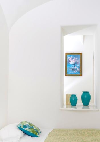 Ένα ή περισσότερα κρεβάτια σε δωμάτιο στο Hotel La Floridiana