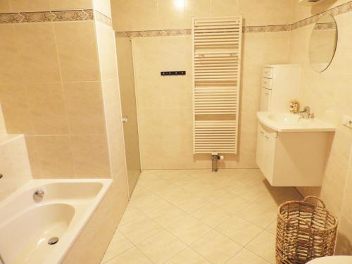 Ένα μπάνιο στο Bed and Breakfast De Kleine Vos