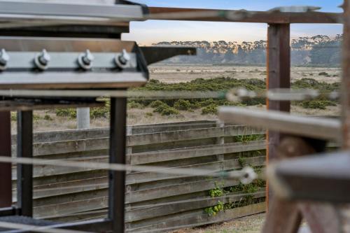a view of the desert from a fence at Nature's Edge Hideaway in Ocean Grove