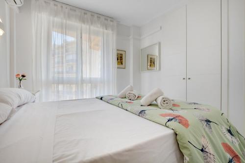 Llit o llits en una habitació de Erisa 59 By IVI Real Estate