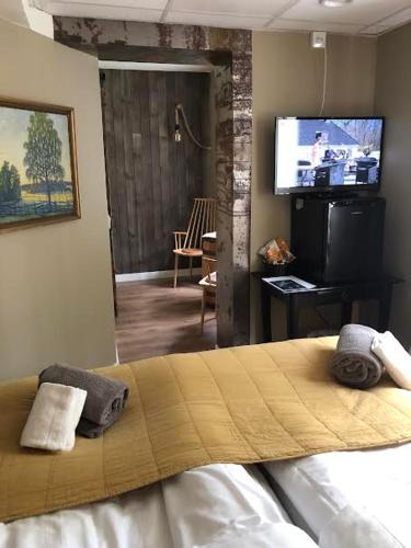 Postel nebo postele na pokoji v ubytování Steel Hotel