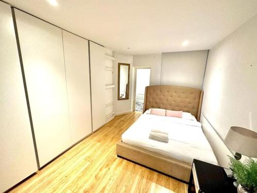 a bedroom with a large bed in a room at Haymarket 2: Large Central Apt! in London