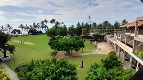 an aerial view of a park with trees and buildings at Laya Beach in Wadduwa