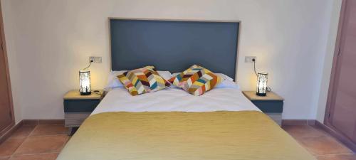 Katil atau katil-katil dalam bilik di Apartamento Calamina