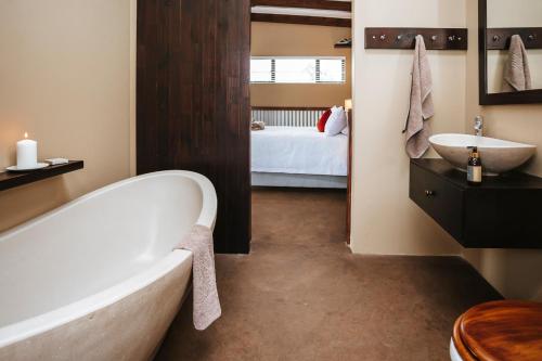 Postel nebo postele na pokoji v ubytování Rockdell Lodge