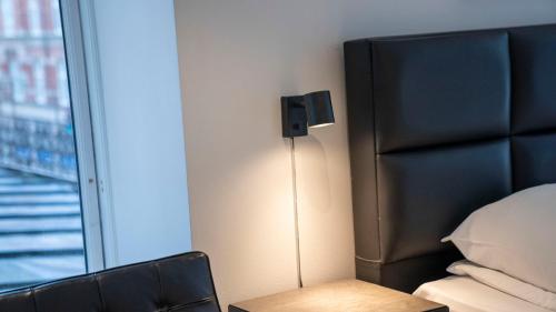 Postel nebo postele na pokoji v ubytování A Hotels City