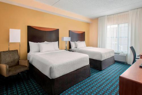 Säng eller sängar i ett rum på Fairfield inn & Suites by Marriott Baltimore Downtown/Inner Harbor