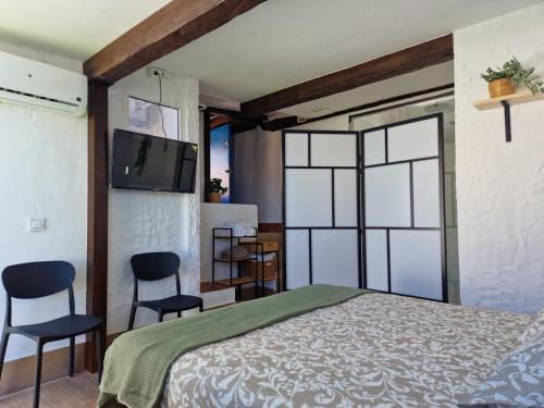Posteľ alebo postele v izbe v ubytovaní Hotel Boutique Nomadas