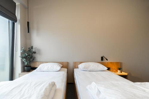 Cama o camas de una habitación en Hotel MiraMar smart room