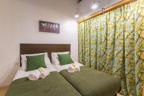 Cama ou camas em um quarto em Baluard-Apartment only 100 meters from the beach
