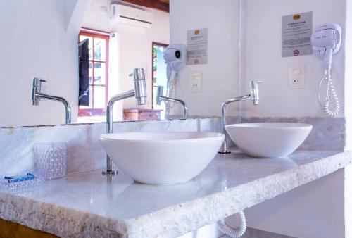 Ένα μπάνιο στο Pousada Recanto da Villa