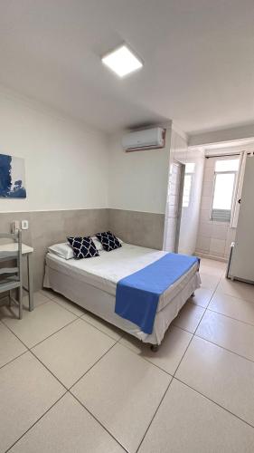 Ένα ή περισσότερα κρεβάτια σε δωμάτιο στο Pousada São Luiz