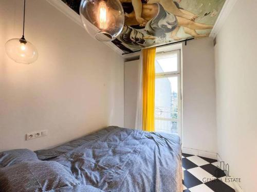 Postel nebo postele na pokoji v ubytování Aesthetic apartment Krakow-Center