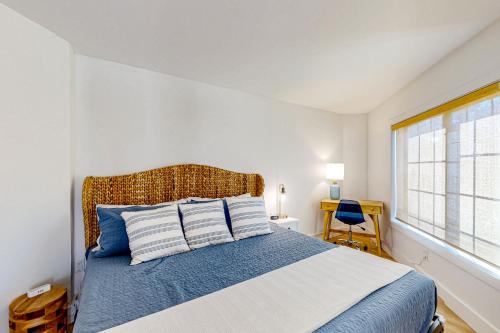Ένα ή περισσότερα κρεβάτια σε δωμάτιο στο Ocean Walk Villas 303