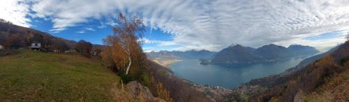 a view of a lake in the middle of a mountain at Agriturismo Piccolo paradiso in Pianello Del Lario