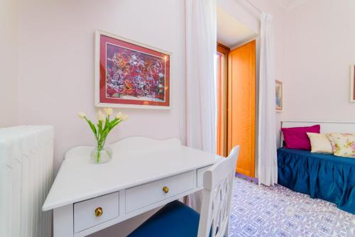 Ένα ή περισσότερα κρεβάτια σε δωμάτιο στο Hotel La Bussola