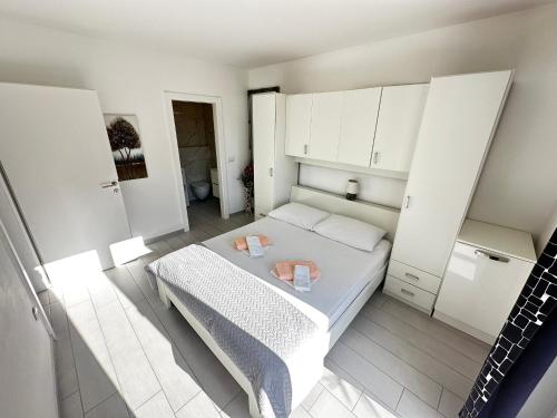 Ένα ή περισσότερα κρεβάτια σε δωμάτιο στο Apartments Danica