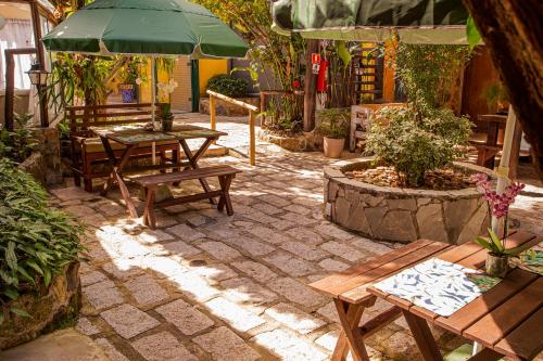 Κήπος έξω από το Pousada Recanto da Villa