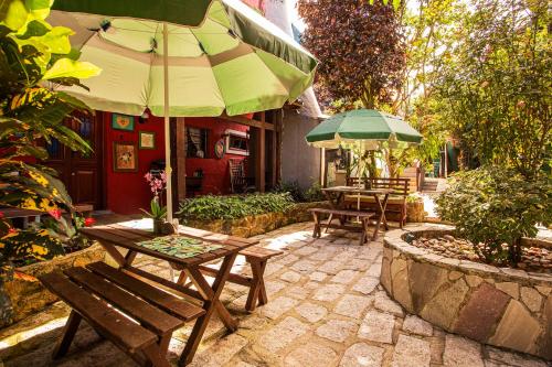 Κήπος έξω από το Pousada Recanto da Villa
