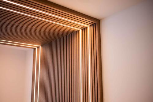 a wall with a window with vertical blinds at Luxurious 35m2 Designer Studio - R51A in Eindhoven