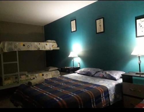 Ein Bett oder Betten in einem Zimmer der Unterkunft HOSTAL DEL SOL