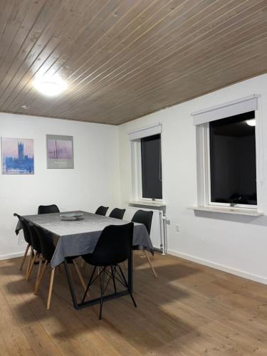 a dining room with a table and chairs at House in Billund in Billund