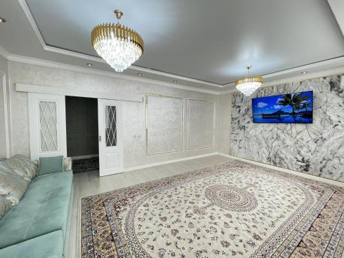 TV a/nebo společenská místnost v ubytování # 31 Элегантная и просторная квартира