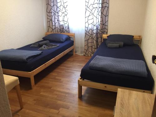 Ein Bett oder Betten in einem Zimmer der Unterkunft Luxury House with big garden and mountain view ( 3 bedrooms)