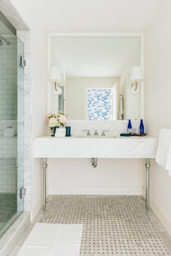 a bathroom with a sink and a mirror at Gardiner House in Newport