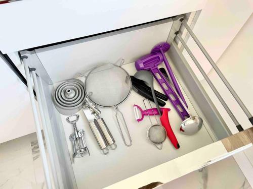 a drawer filled with lots of kitchen utensils at Apartmán v meste Michalovce in Michalovce