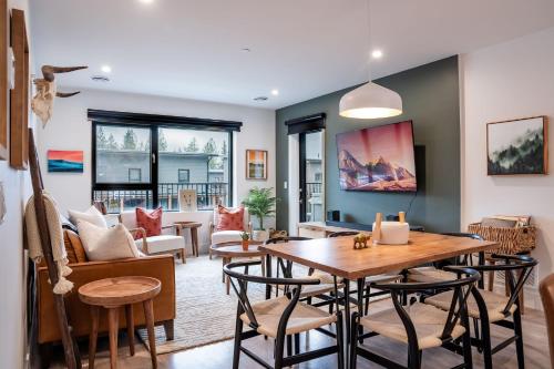 a living room with a table and chairs at Hemlock Hangout by Revelstoke Vacations in Revelstoke