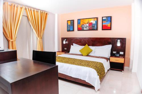 Hotel Luxor Cúcutaにあるベッド